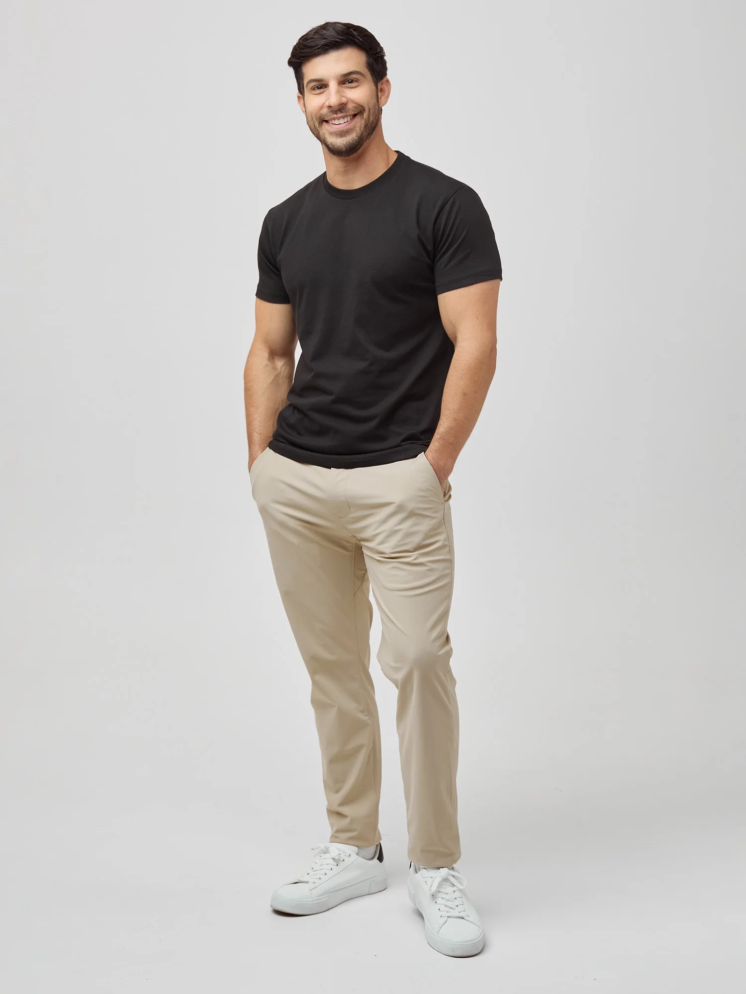 Joey in a black short-length crew tee